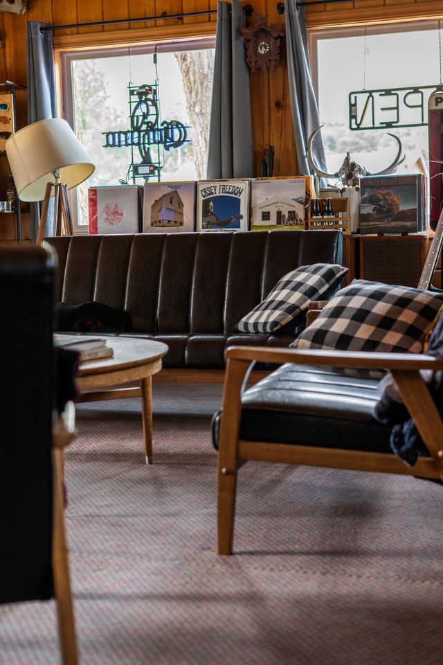 Andruss Motel room interior — knotty pine, vintage vibes